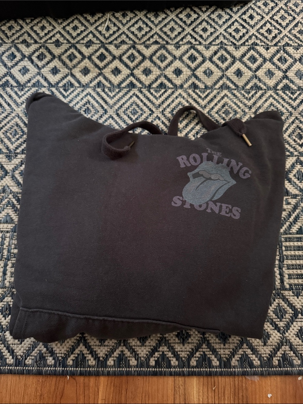 the Rolling Stones Black sweatshirtwith Faded Purple Logo
